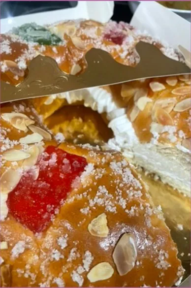 Food photograph — roscón-style pastry with candied fruit